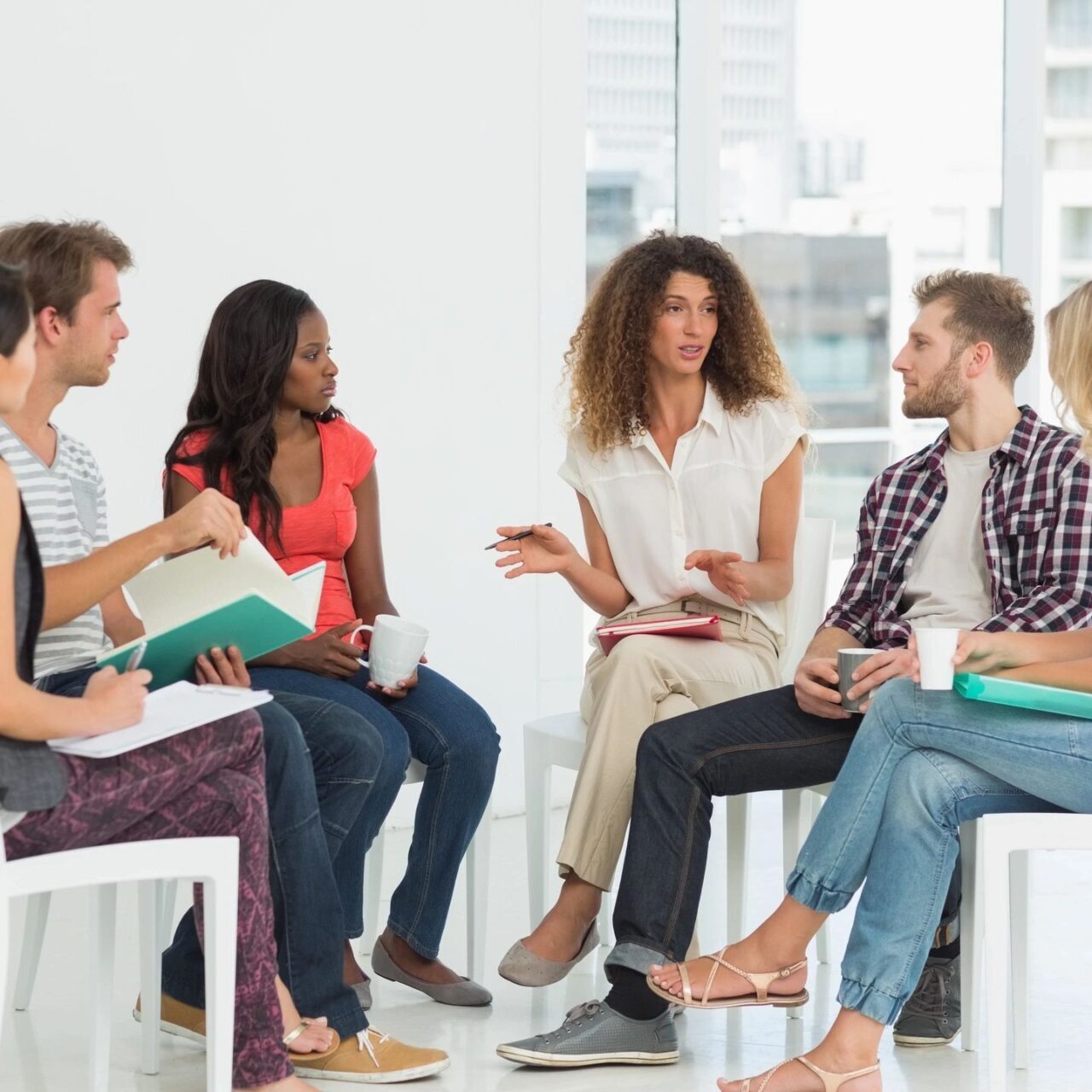 Diverse group discussion seated in a circle